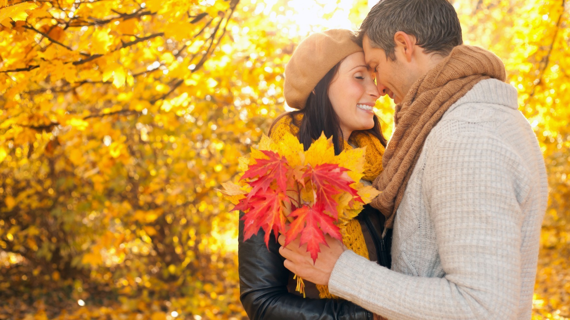 couples fall outdoors maple park nature love woman happiness leaf girl beautiful two adult leisure fun family man romance smile