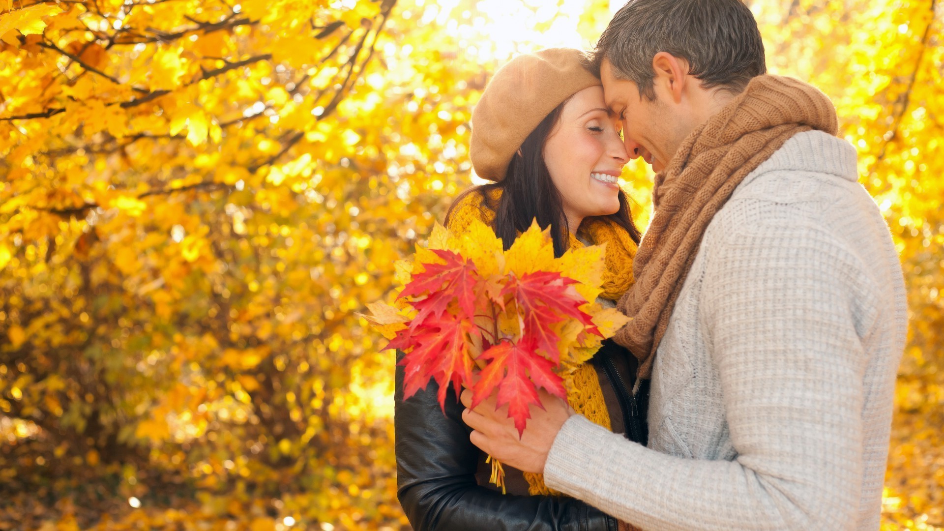 couples fall outdoors maple park nature love woman happiness leaf girl beautiful two adult leisure fun family man romance smile