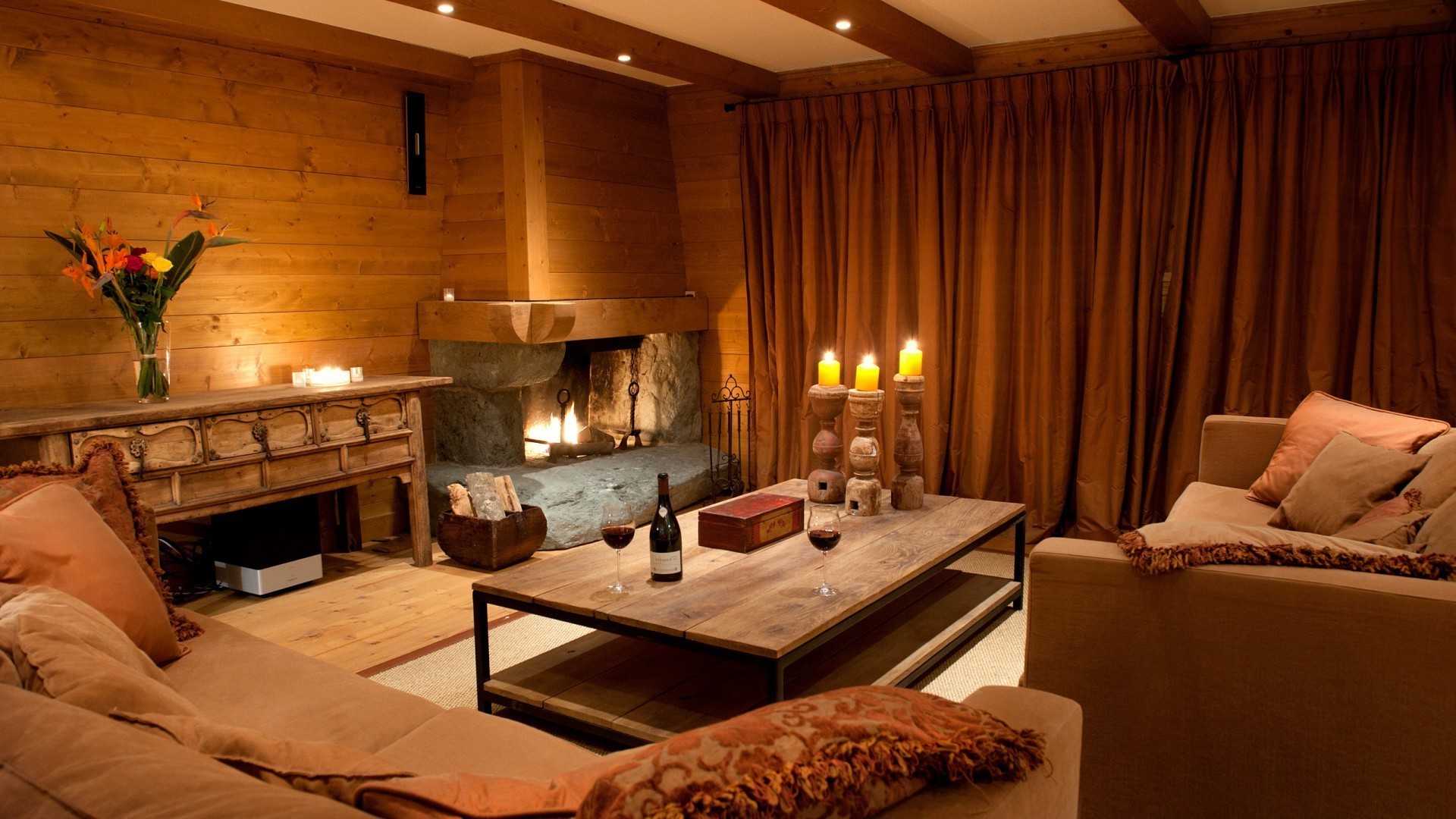fireplace furniture room indoors bed bedroom lamp interior design seat home hotel house pillow sofa table chair family rug cozy luxury