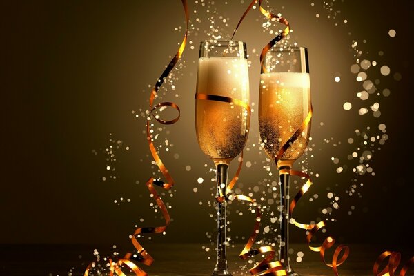 Festive glasses. Splashes of champagne