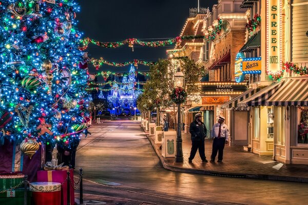 Christmas evening street decorated with lights