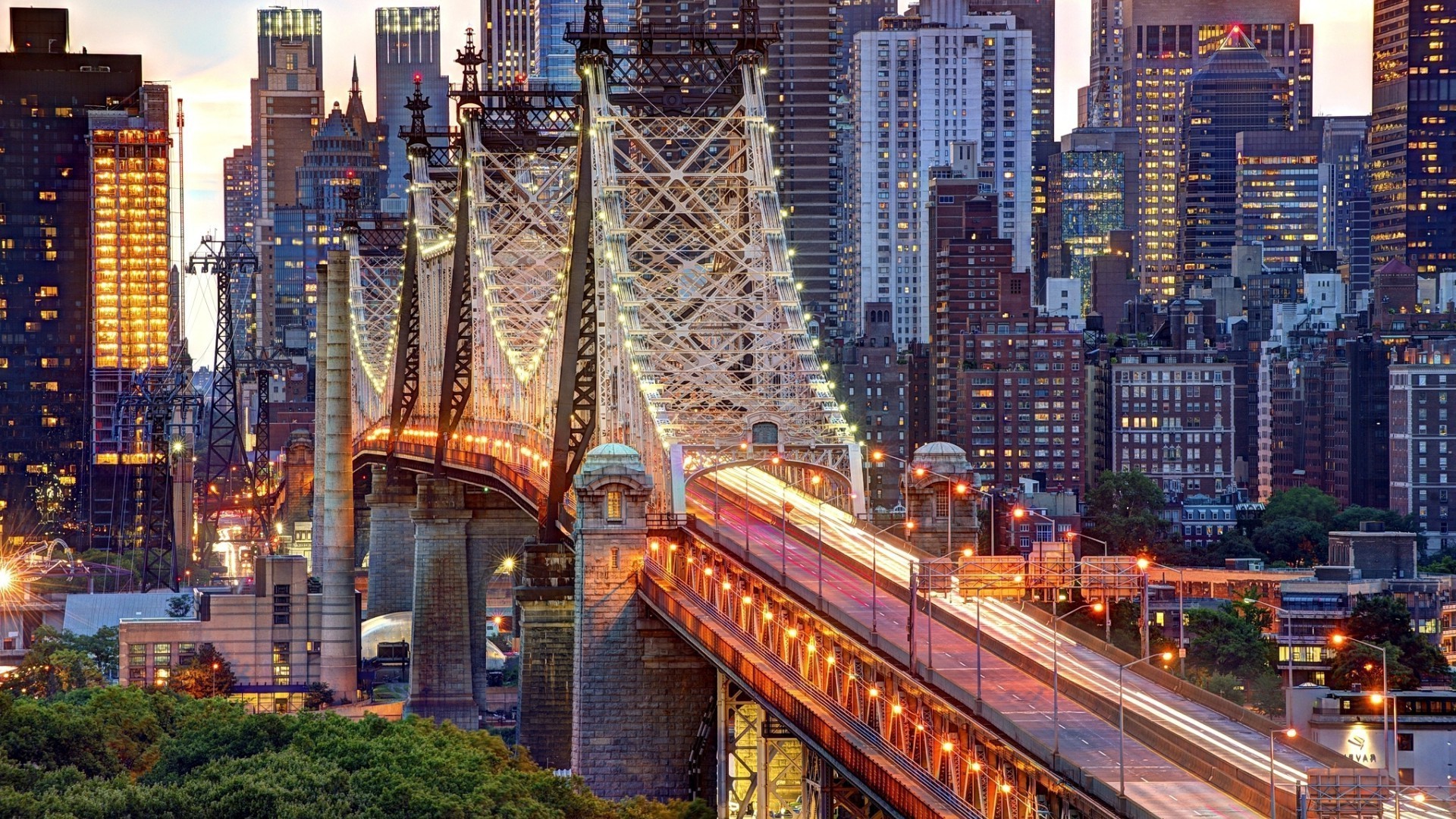 bridges city travel dusk architecture downtown traffic skyscraper cityscape skyline urban building bridge modern evening road illuminated sky tower river