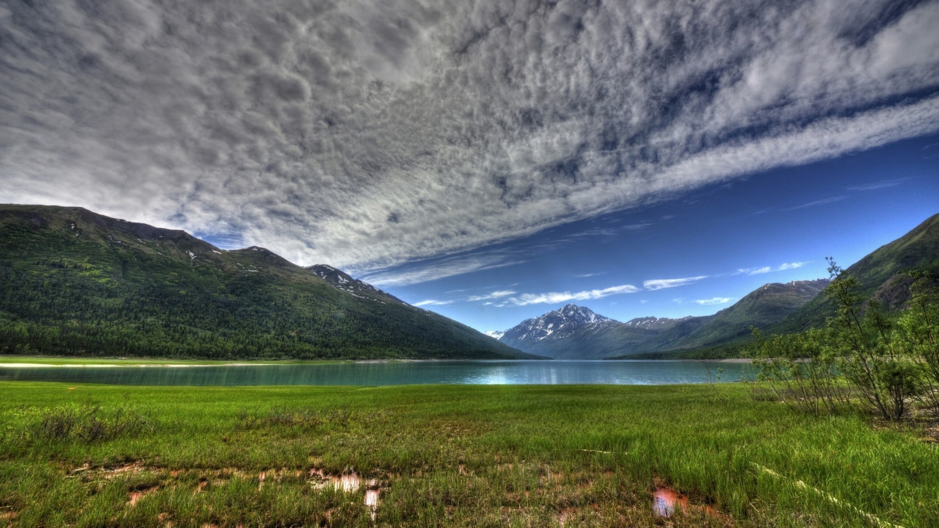 lake landscape mountain travel water sky outdoors nature valley scenic grass hill