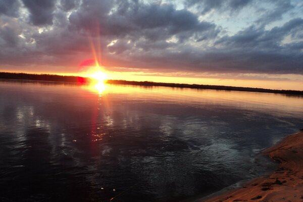 Beautiful sunset near the pond and stream
