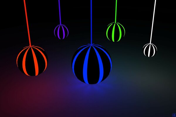 Hanging watermelons on a dark background