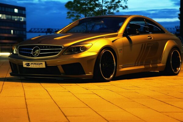 Luxury sports car on the city landscape