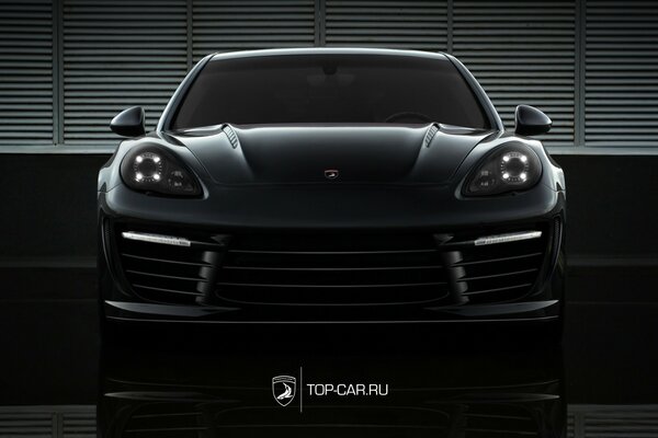 Black Aggressive Porsche In The Building