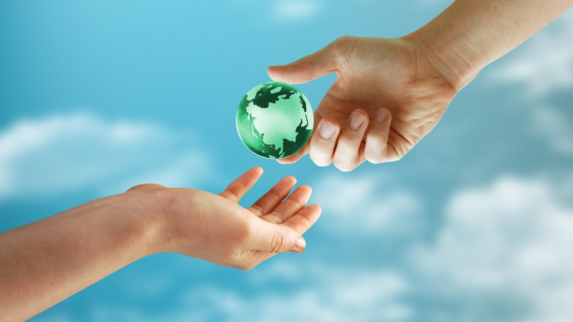 photo manipulation ball-shaped hand spherical woman ecology conceptual environment palm planet protection responsibility touch cooperation universe nature