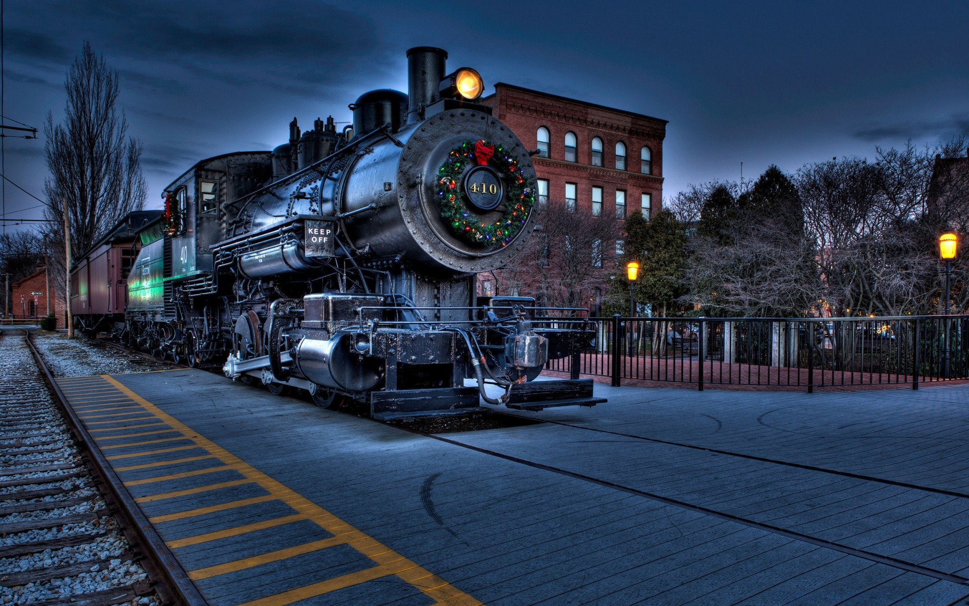 trains travel train street railway city light urban transportation system winter snow outdoors