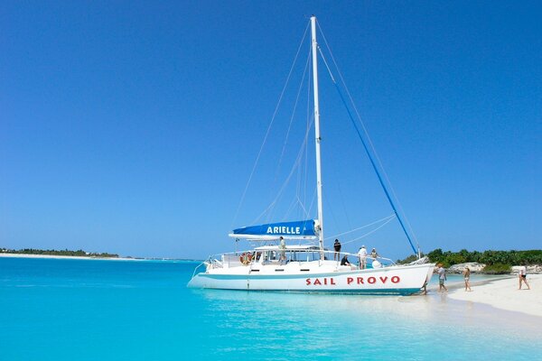 Yacht on the ocean with a flag