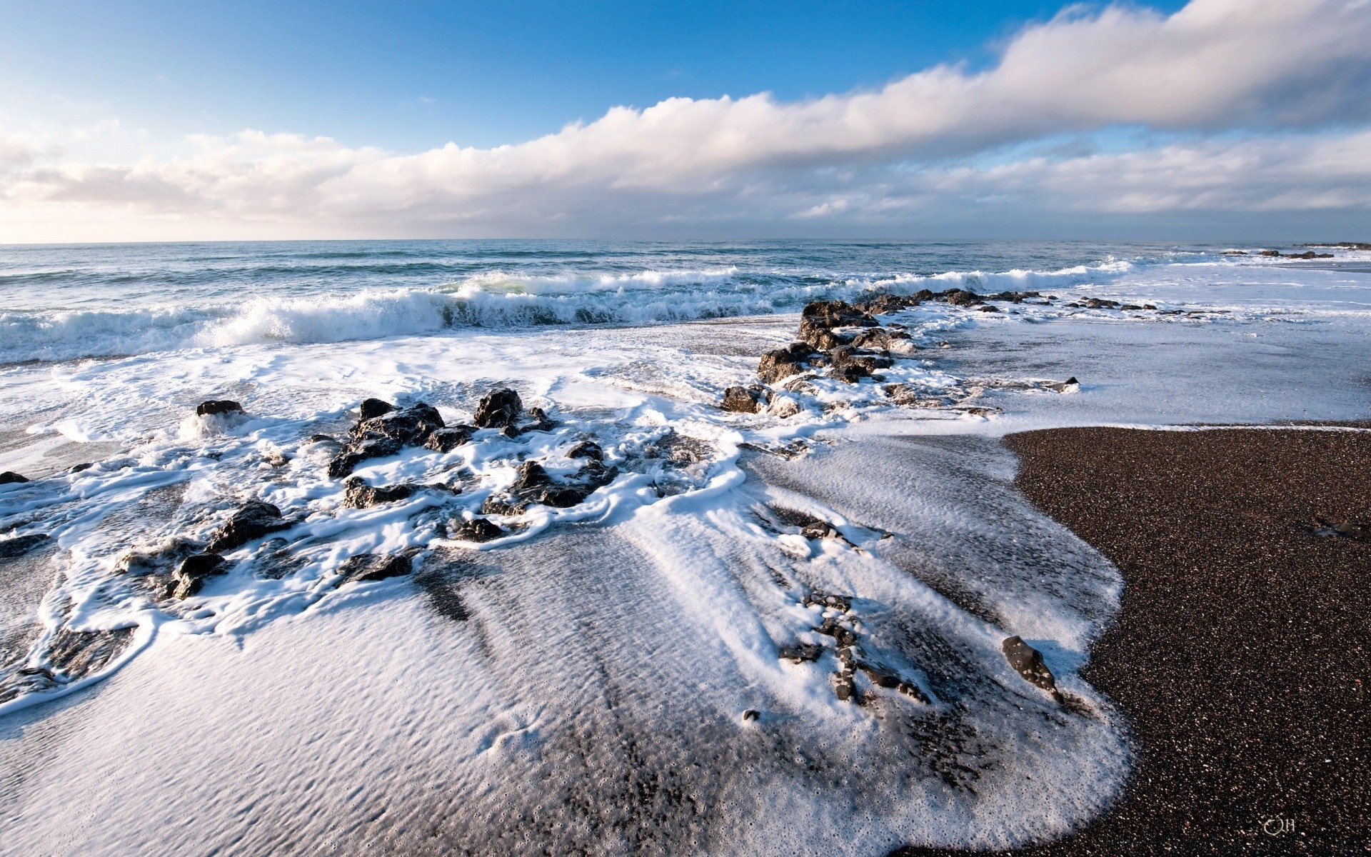 sea and ocean beach water sea seashore ocean sand travel seascape landscape shore sky surf wave nature vacation tide outdoors