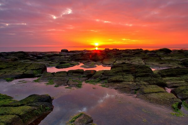Sunset on the beach, southern mountains