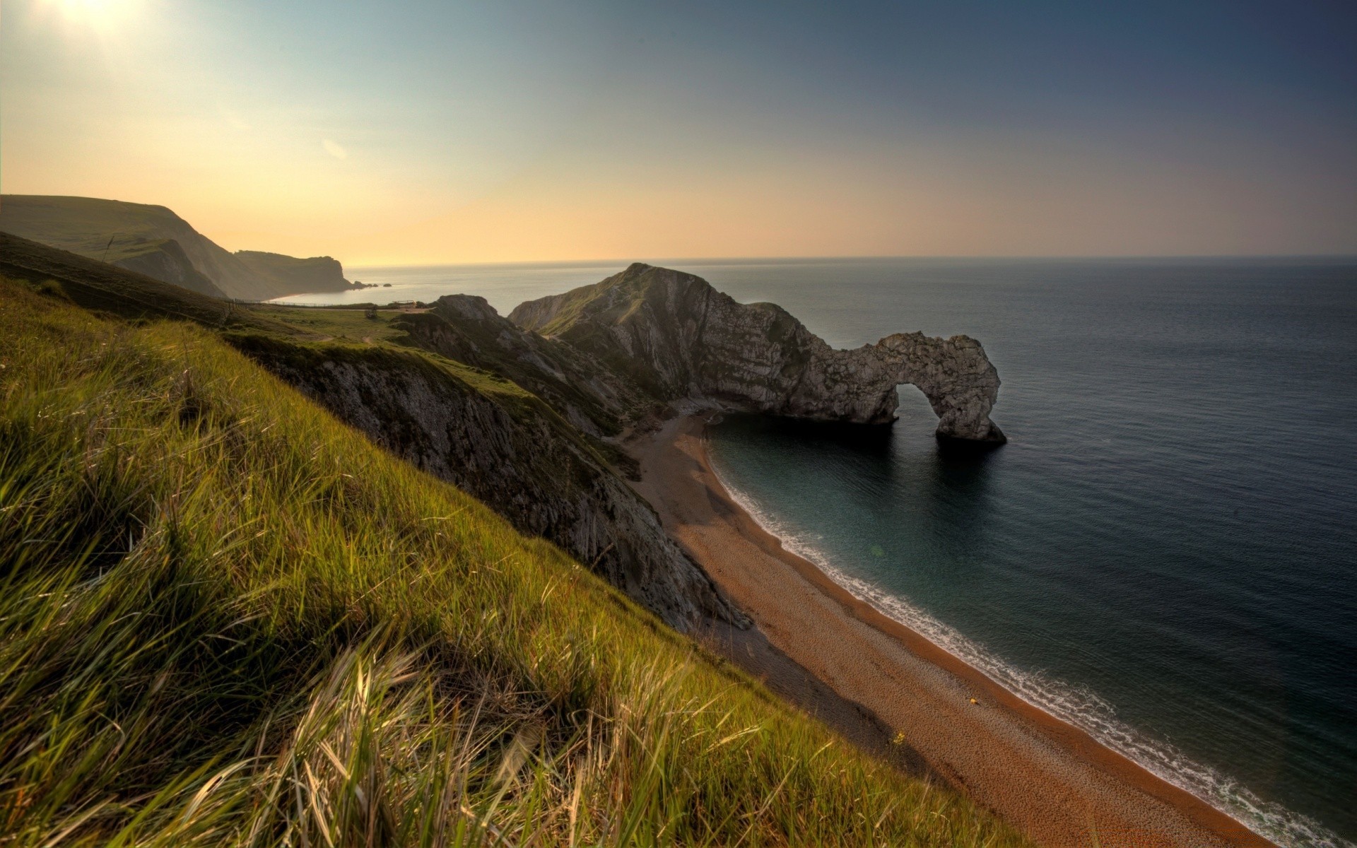 sea and ocean landscape beach sea seashore ocean water sunset sky seascape rock travel nature scenic dawn evening