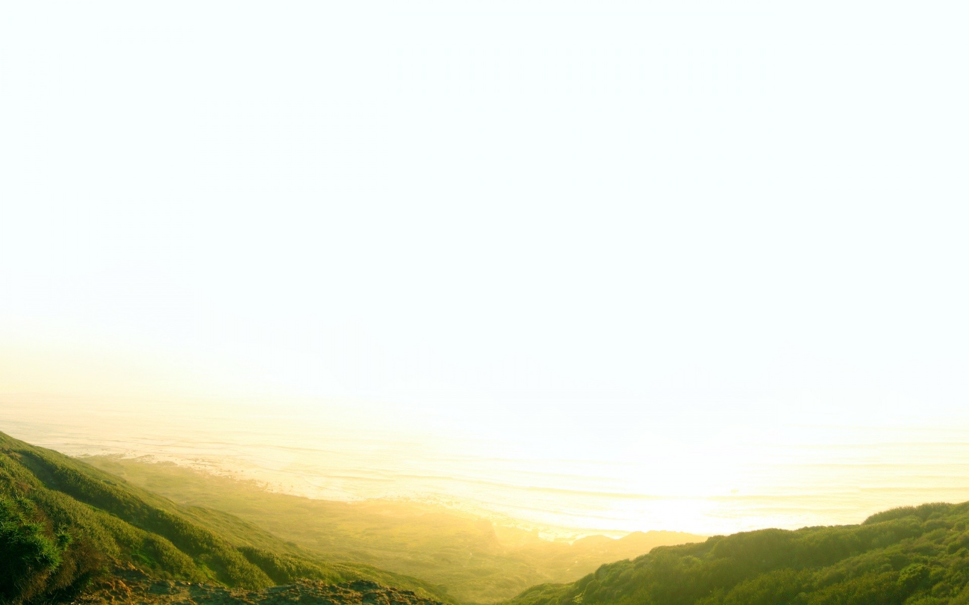 sea and ocean landscape sky nature light outdoors grass fog sun travel mountain tree hill fair weather field color sunset