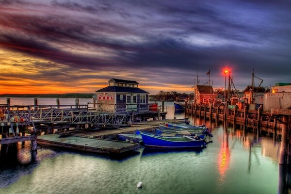 Pier and boats at sunset