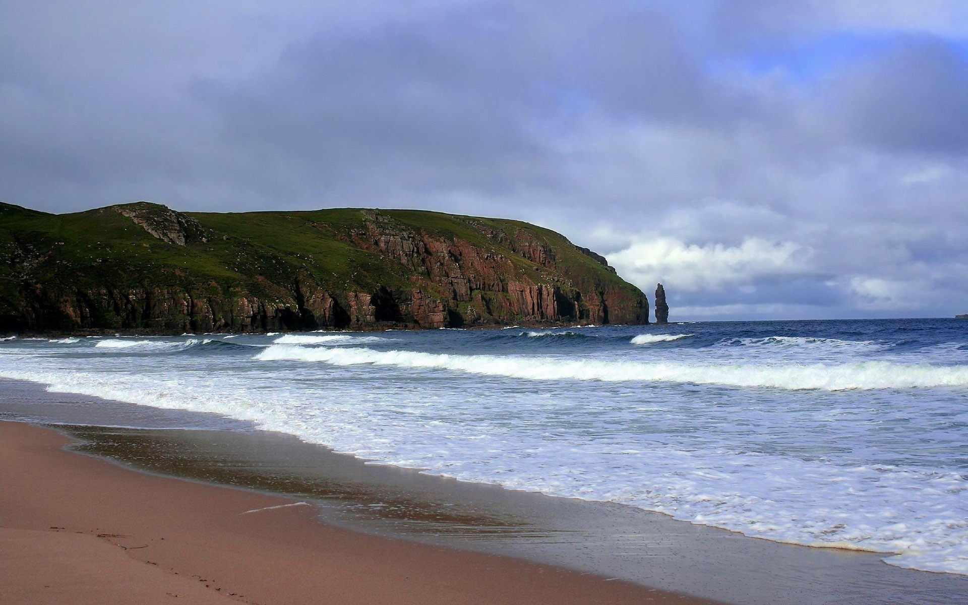 sea and ocean water beach seashore sea surf travel ocean sand landscape seascape wave sky daylight nature outdoors scenic summer rock