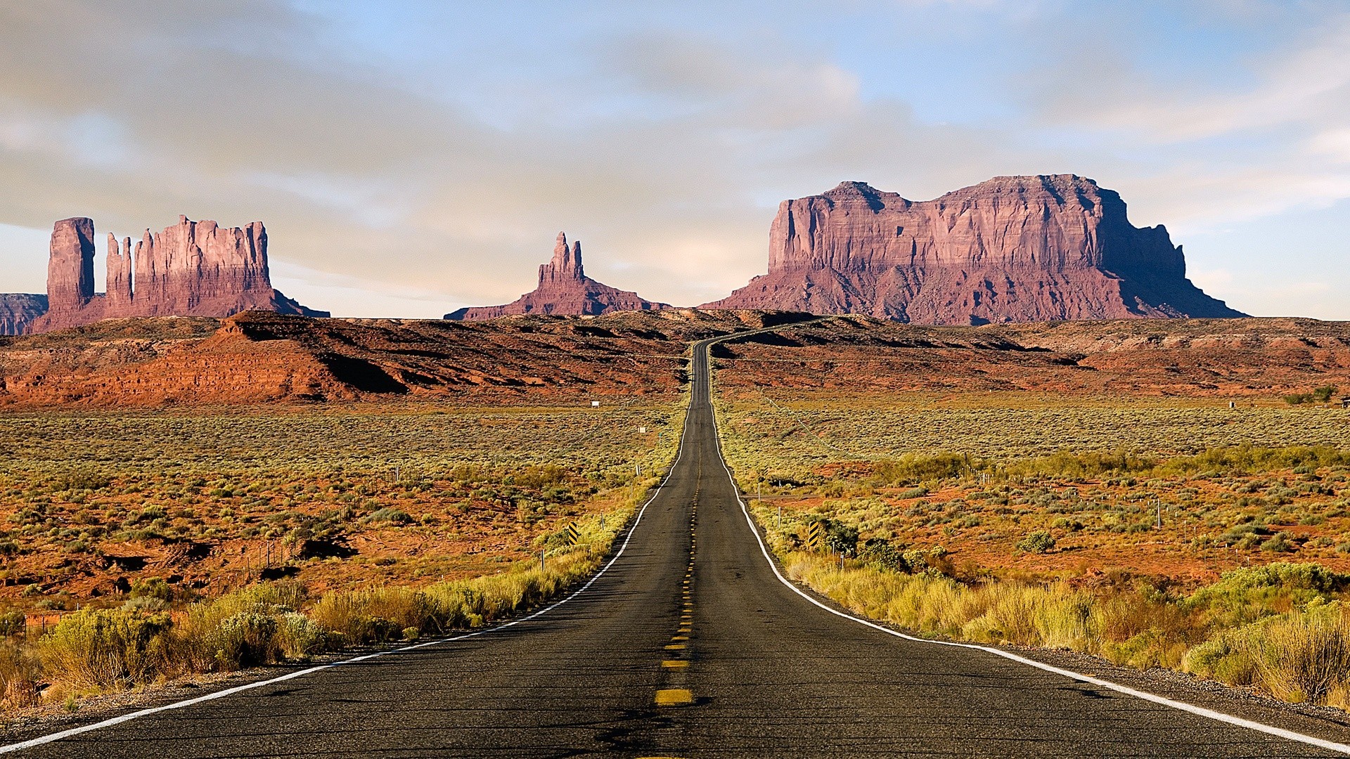 desert travel landscape road sky outdoors sandstone canyon nature scenic mountain arid valley sunset remote rock highway barren dry