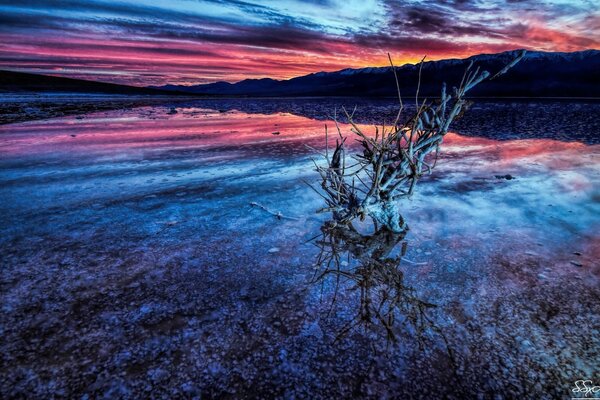 Lake landscape in twilight at sunset