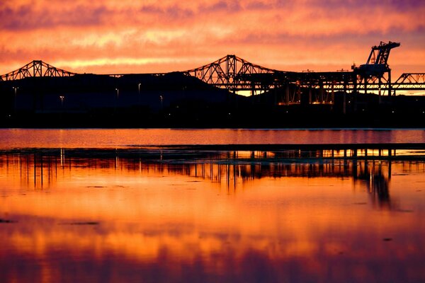 Red sunset reflected in the water