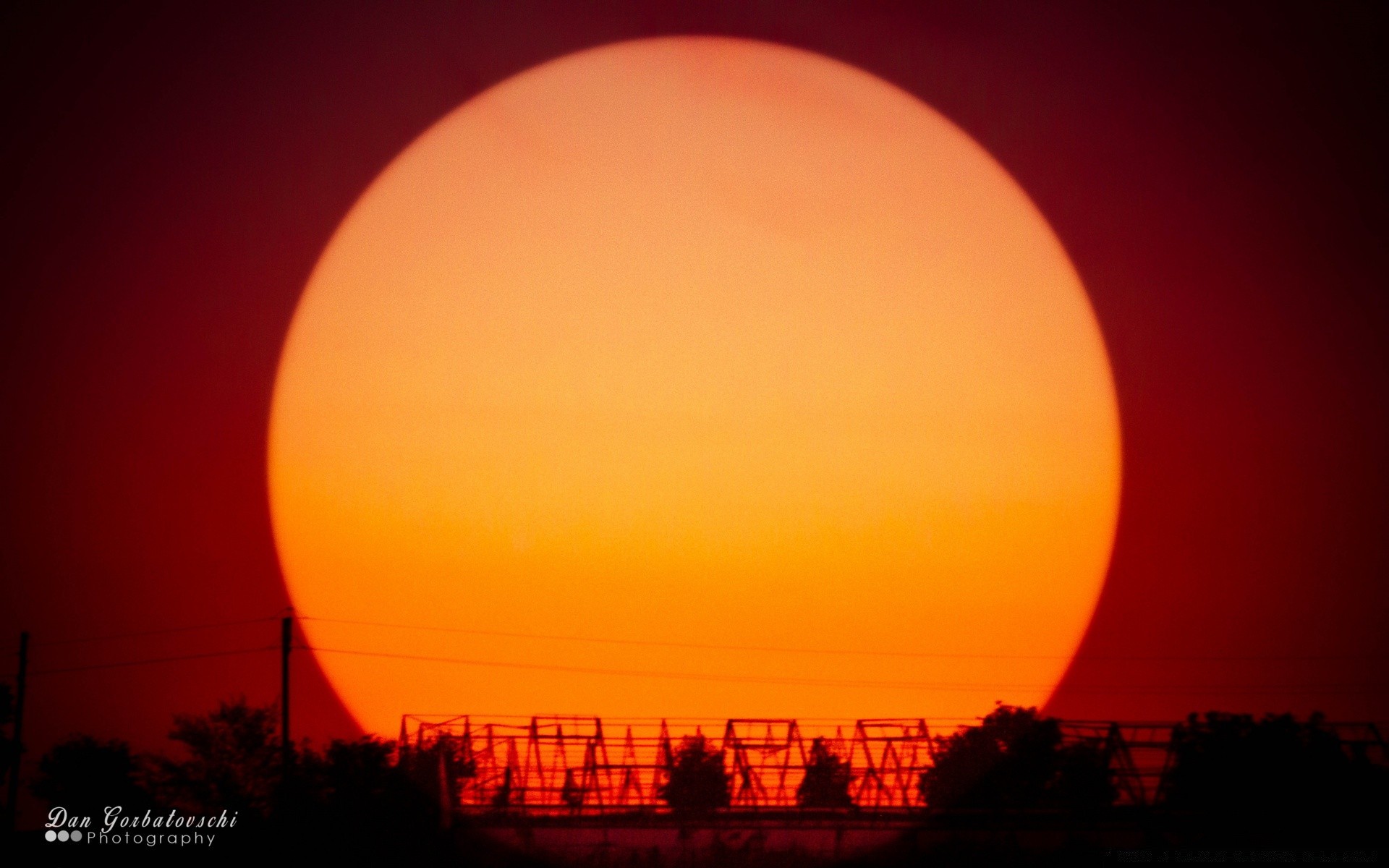 the sky moon sunset sun evening dusk dawn sky dark silhouette light nature outdoors astronomy backlit