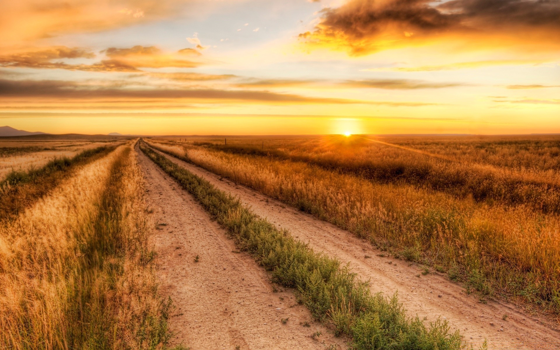 the sky landscape field rural nature agriculture sky country farm countryside soil road sunset outdoors