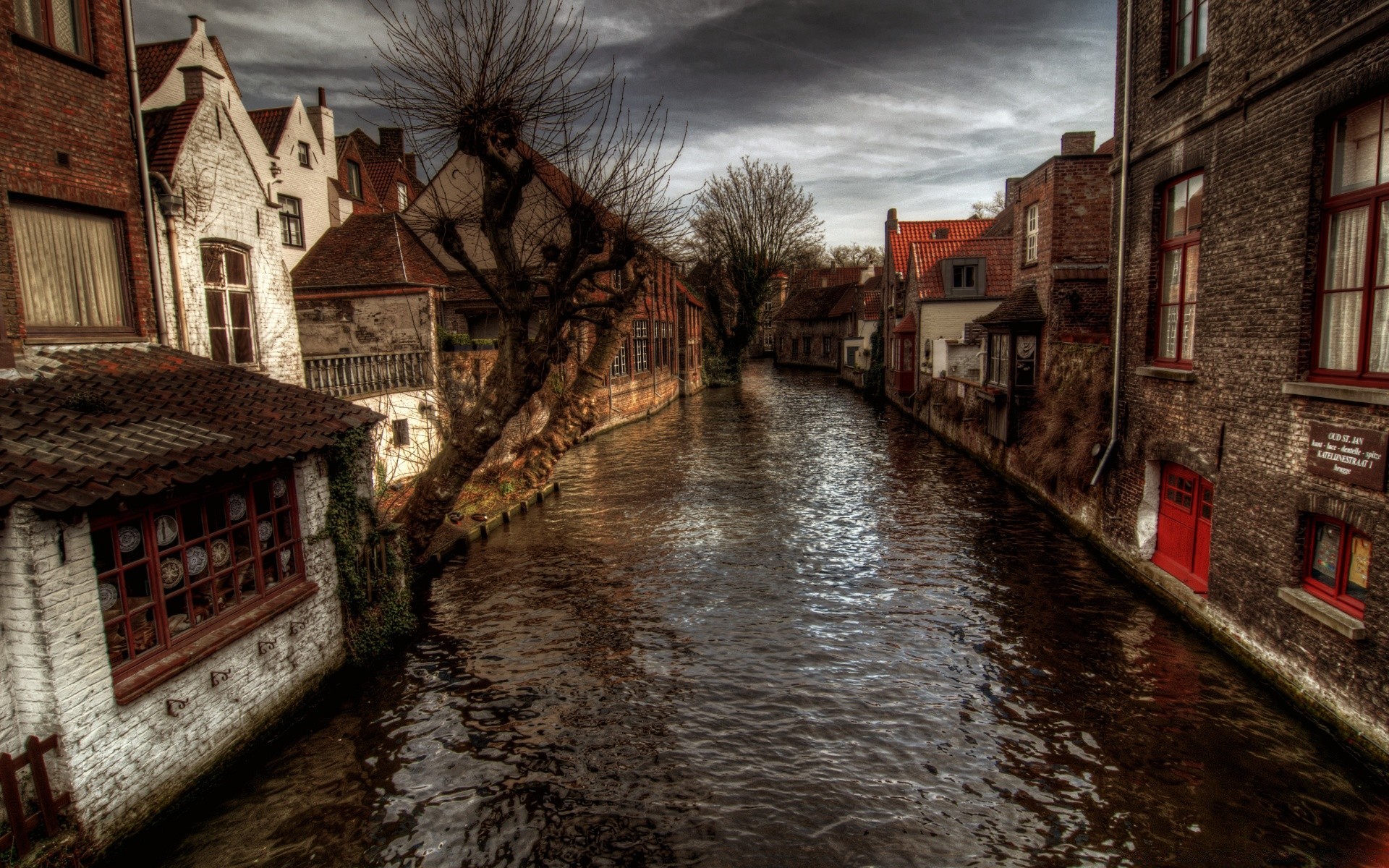 autumn street canal town house architecture building city travel river water winter old urban