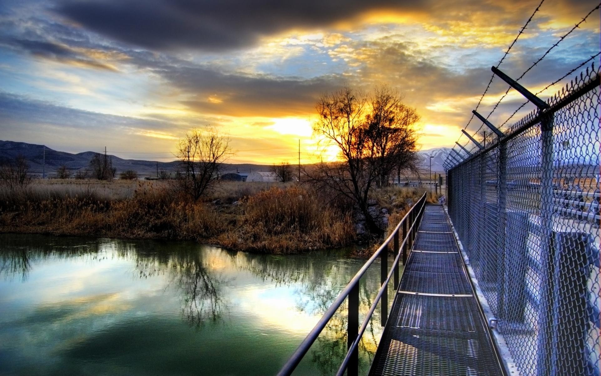 lake water sunset dawn reflection river sky landscape evening dusk light nature bridge travel outdoors sun