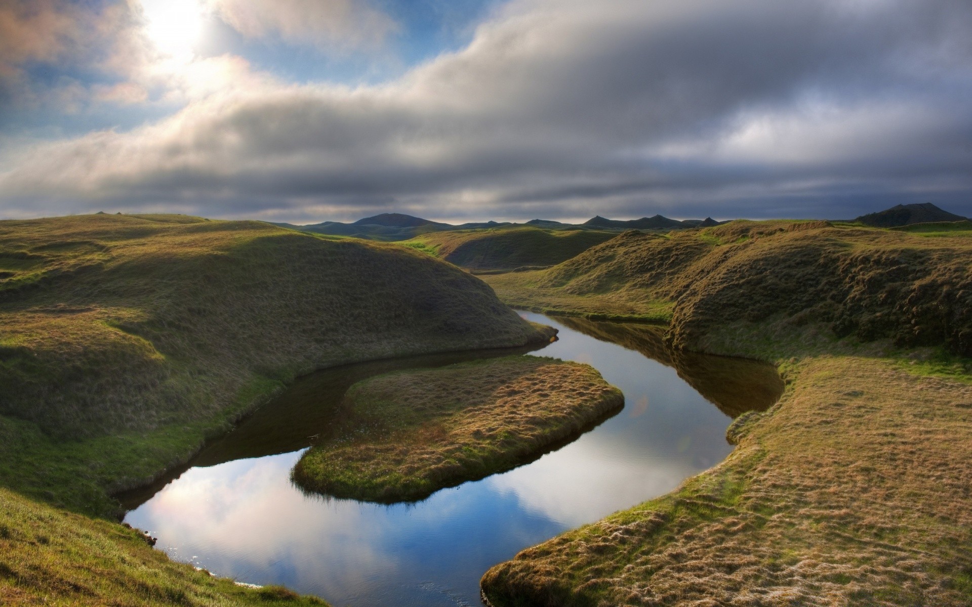 lake landscape water rock river outdoors nature sky scenic grass travel reflection mountain seashore sunset sea