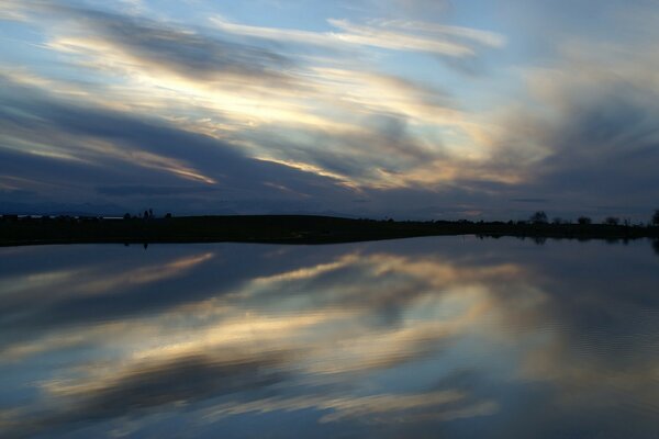 Abstraction dawn in the sky by the water