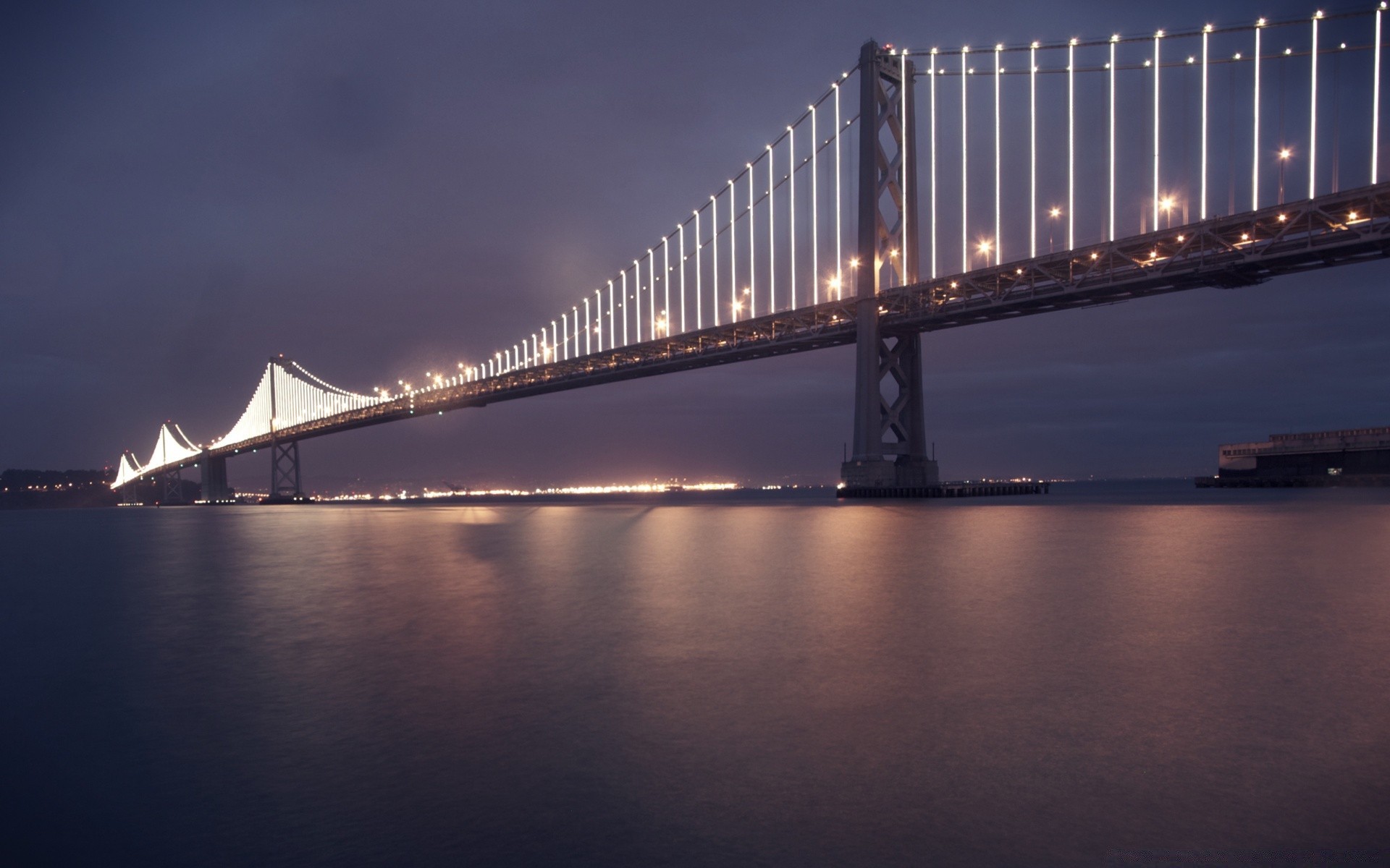 america bridge water suspension bridge river sunset architecture city travel sky transportation system connection reflection dusk evening dawn light building urban