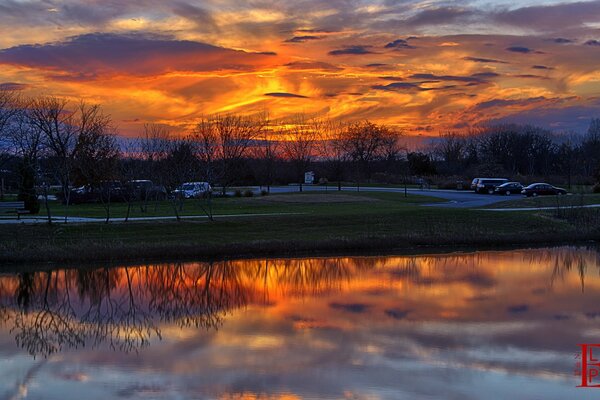 Fiery glare from the sunset on the water