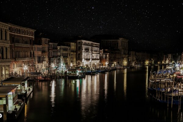 View of the night city standing on the river