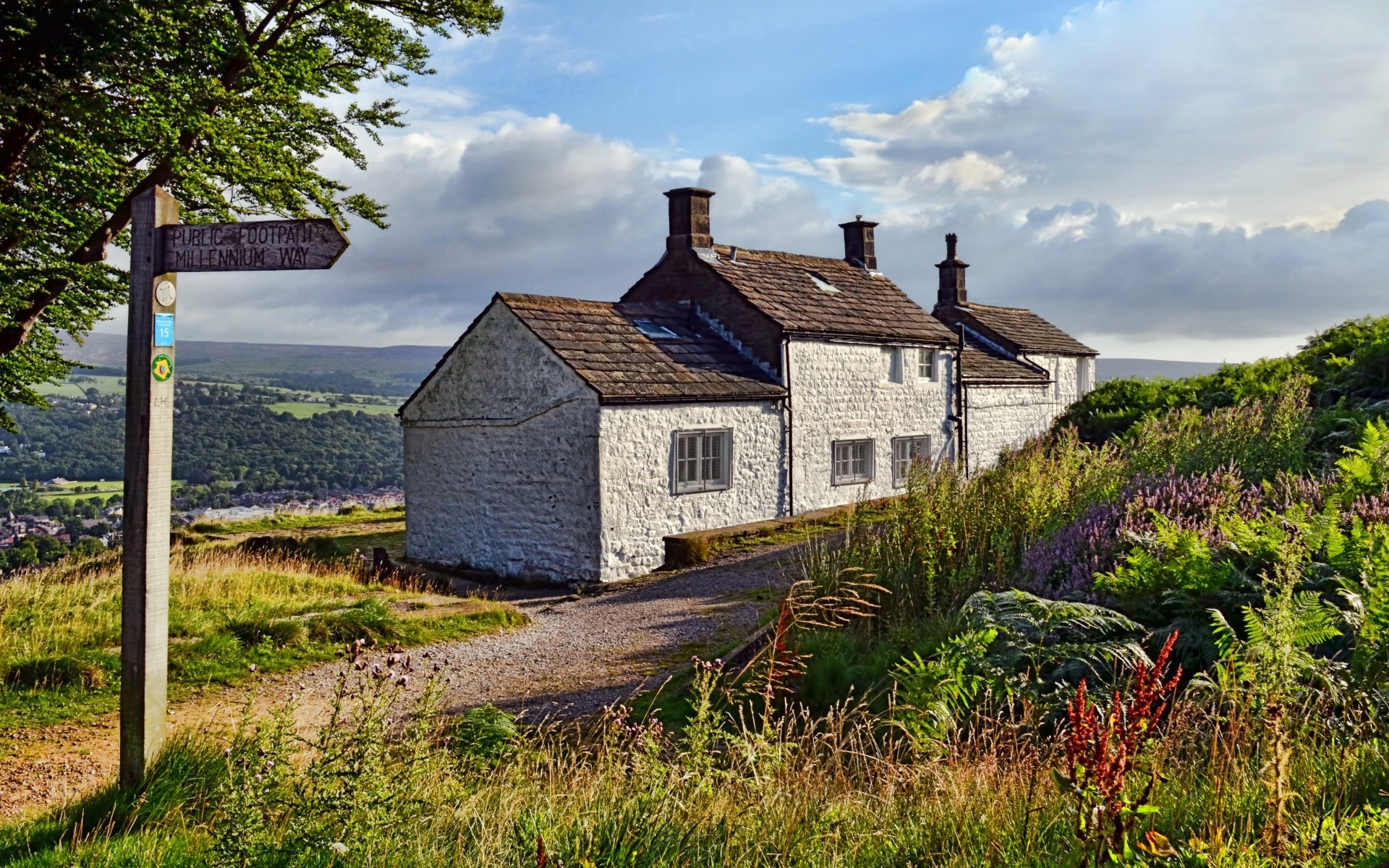 europe house architecture bungalow building summer home outdoors rural grass country sky fence family travel