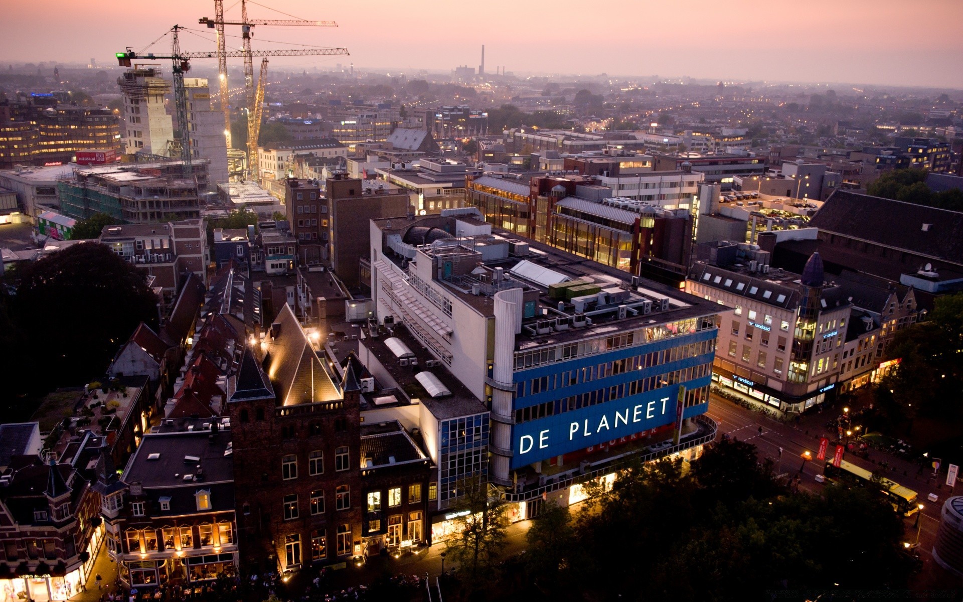 europe city cityscape travel skyline architecture skyscraper dusk building evening traffic urban illuminated downtown sight road sky light office business river