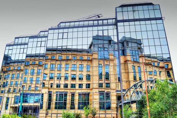 The sky is endlessly reflected in the mirrored windows